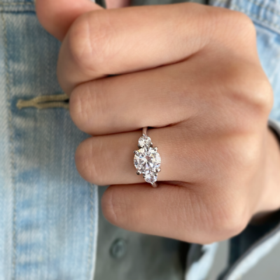 1 Ct Moissanite & .14 Ctw Diamond Adore Three Stone Engagement Ring